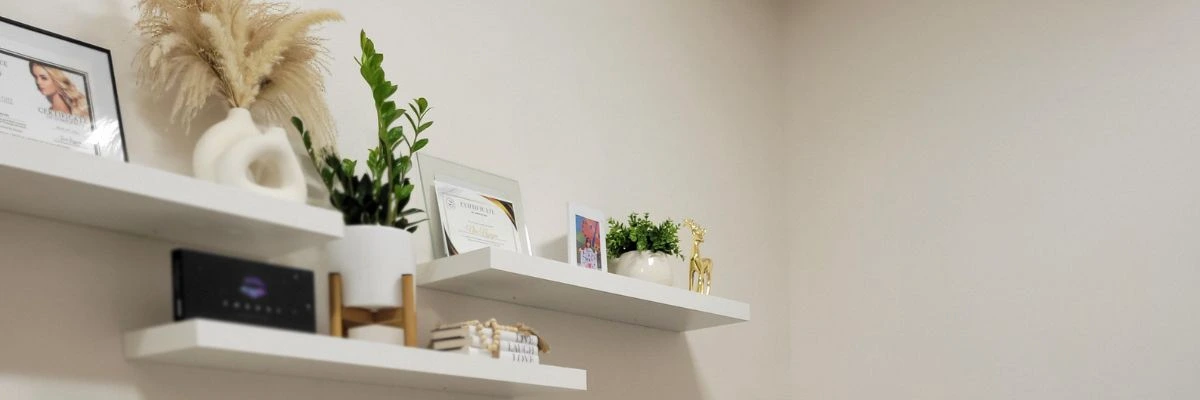 decorated shelving in salon suite